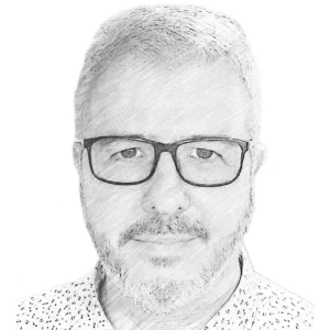 Enric Madrigal en acción durante una ponencia, gesticulando frente a la audiencia